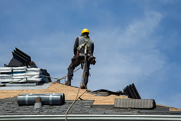 Professional Roof Replacement technician working in Carlisle, MA